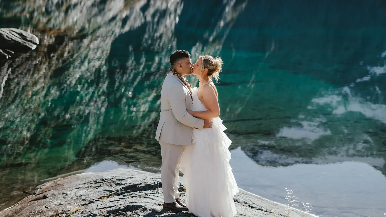 Still frame from the Lake Erskine helicopter elopement teaser